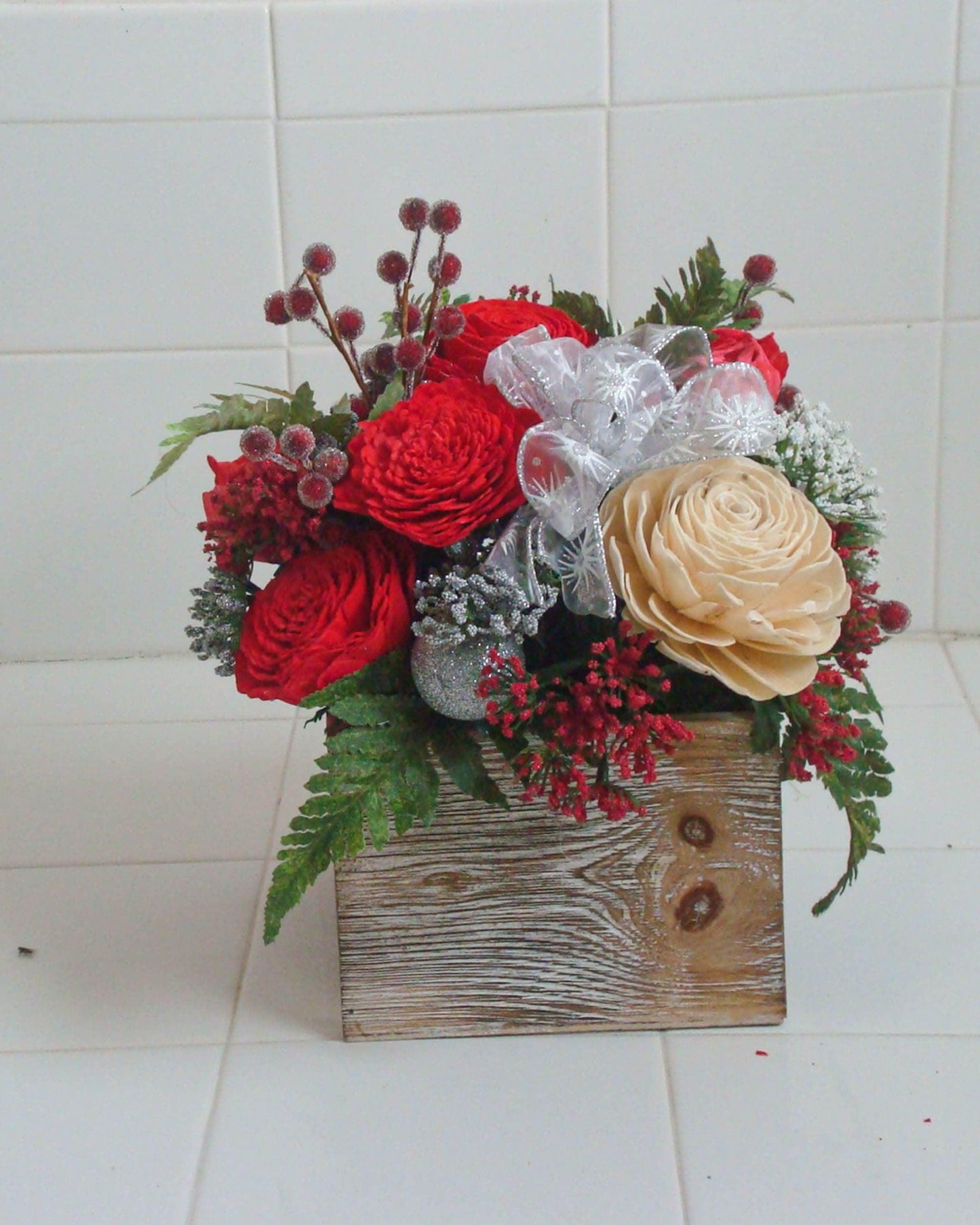 Holiday decoration,  Christmas Centerpiece with berries and sola wood flowers in a wood box, gift