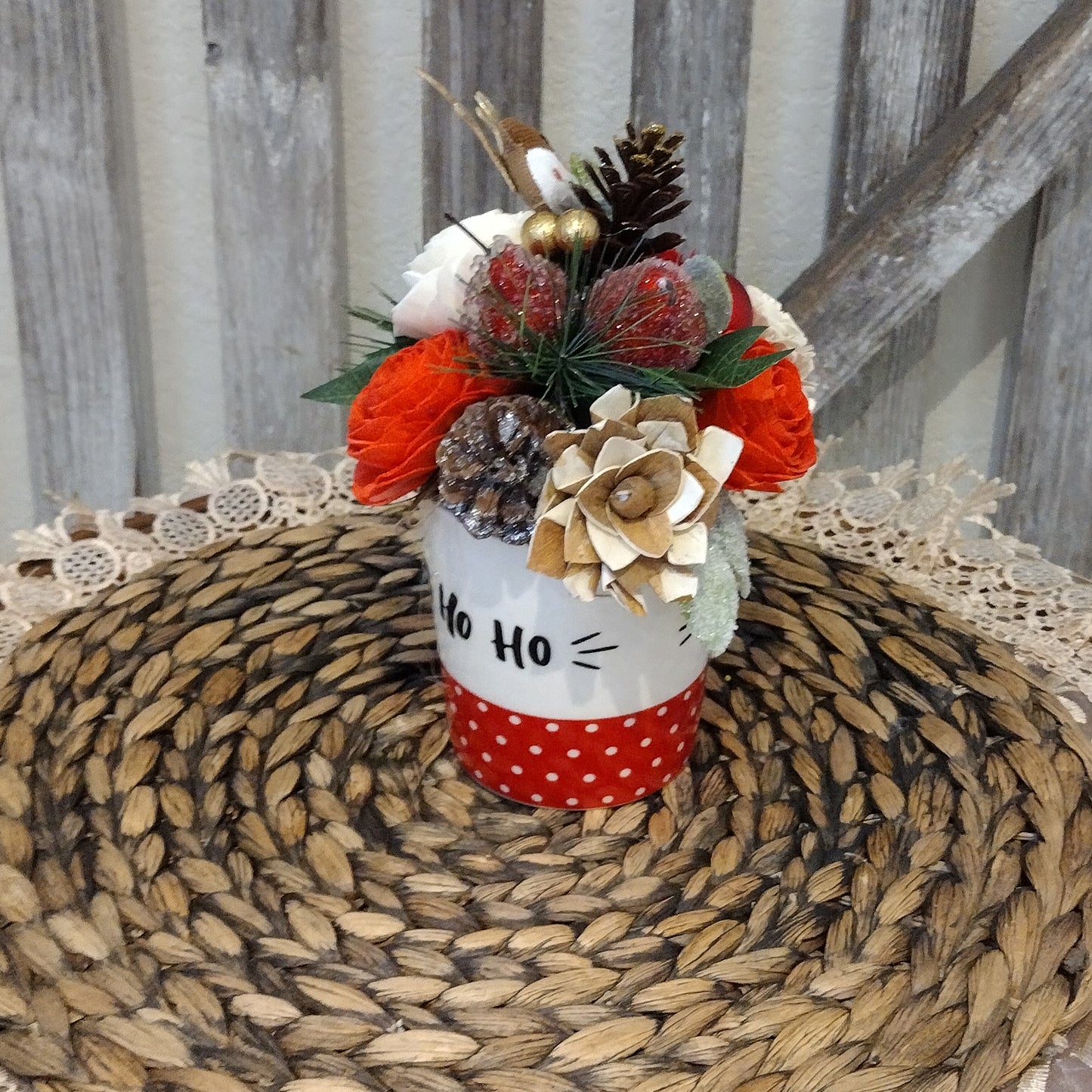 Christmas Ho Ho Ho Mug filled with sola wood flowers