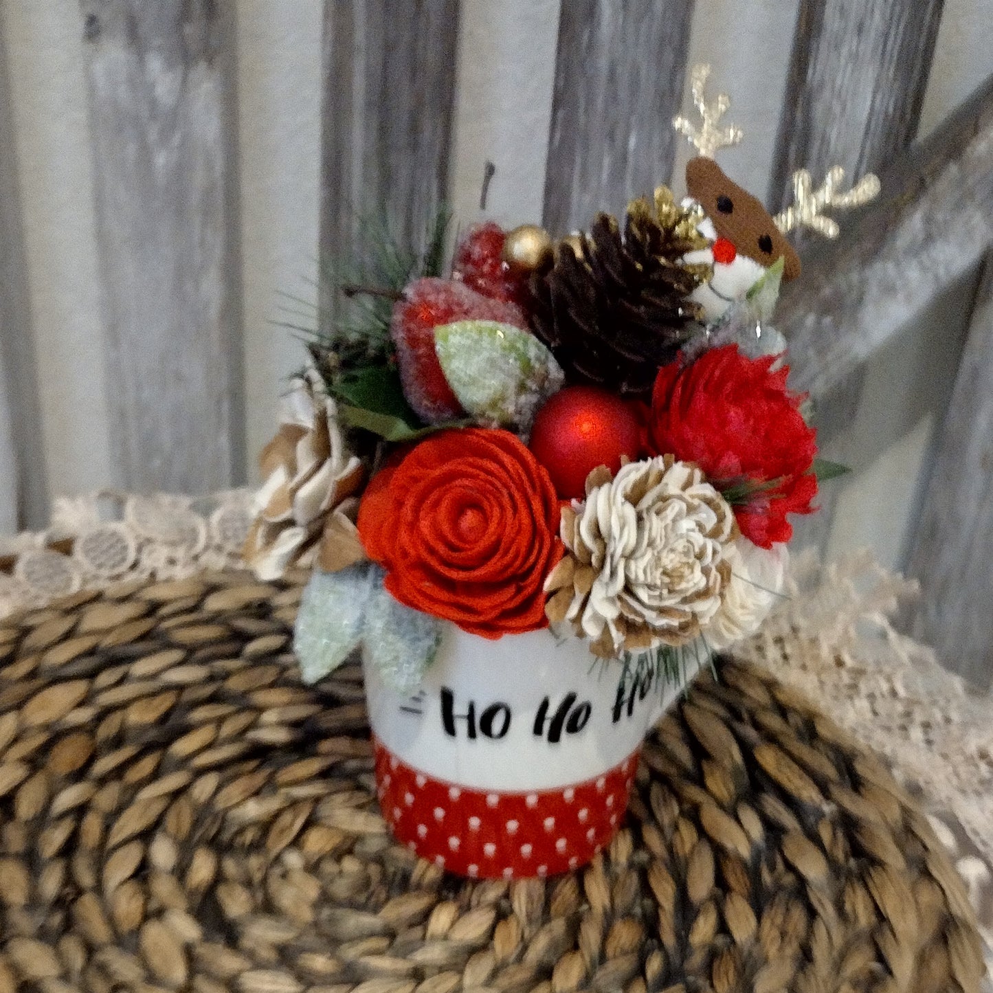 Christmas Ho Ho Ho Mug filled with sola wood flowers