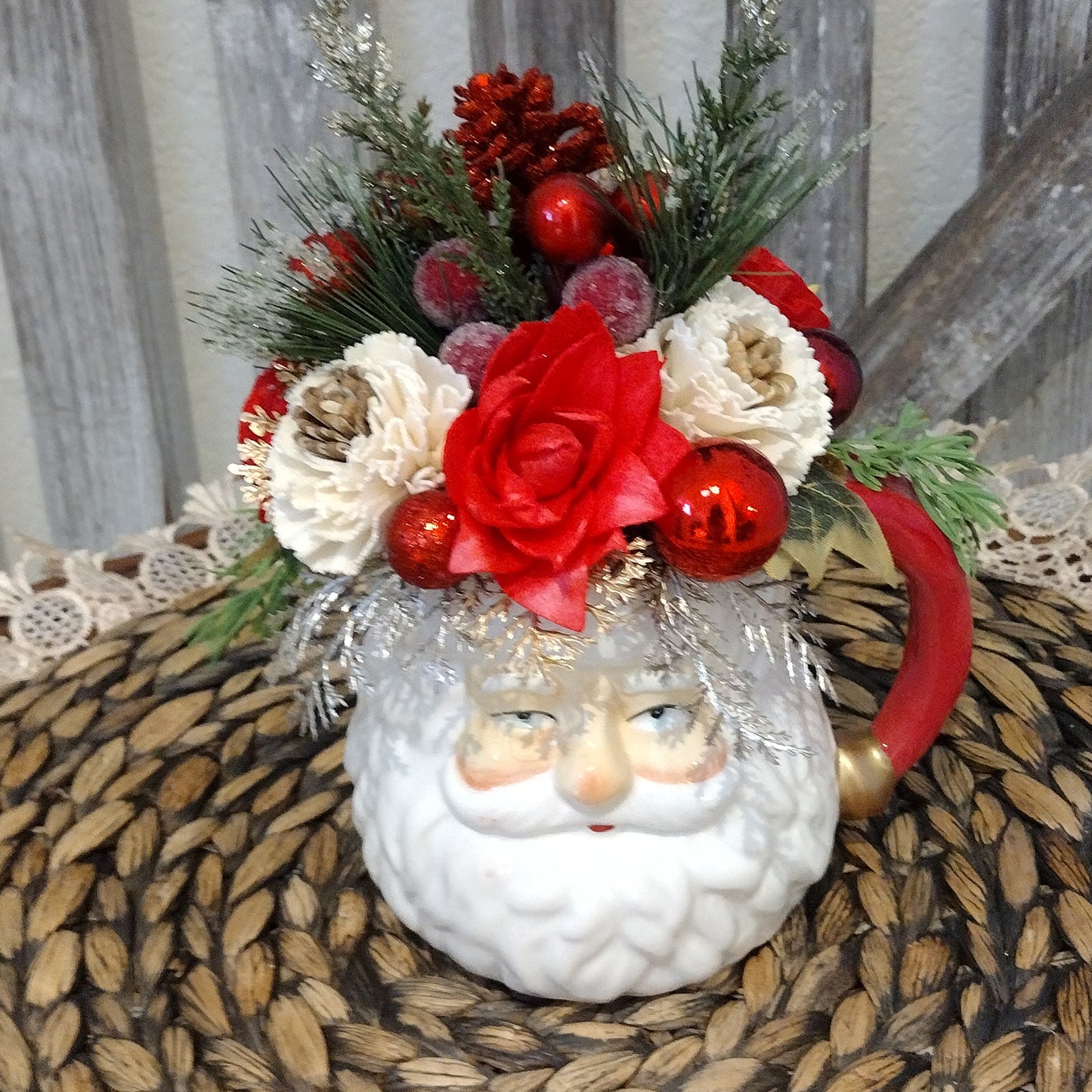 Santa mug filled with sola wood flowers that never die