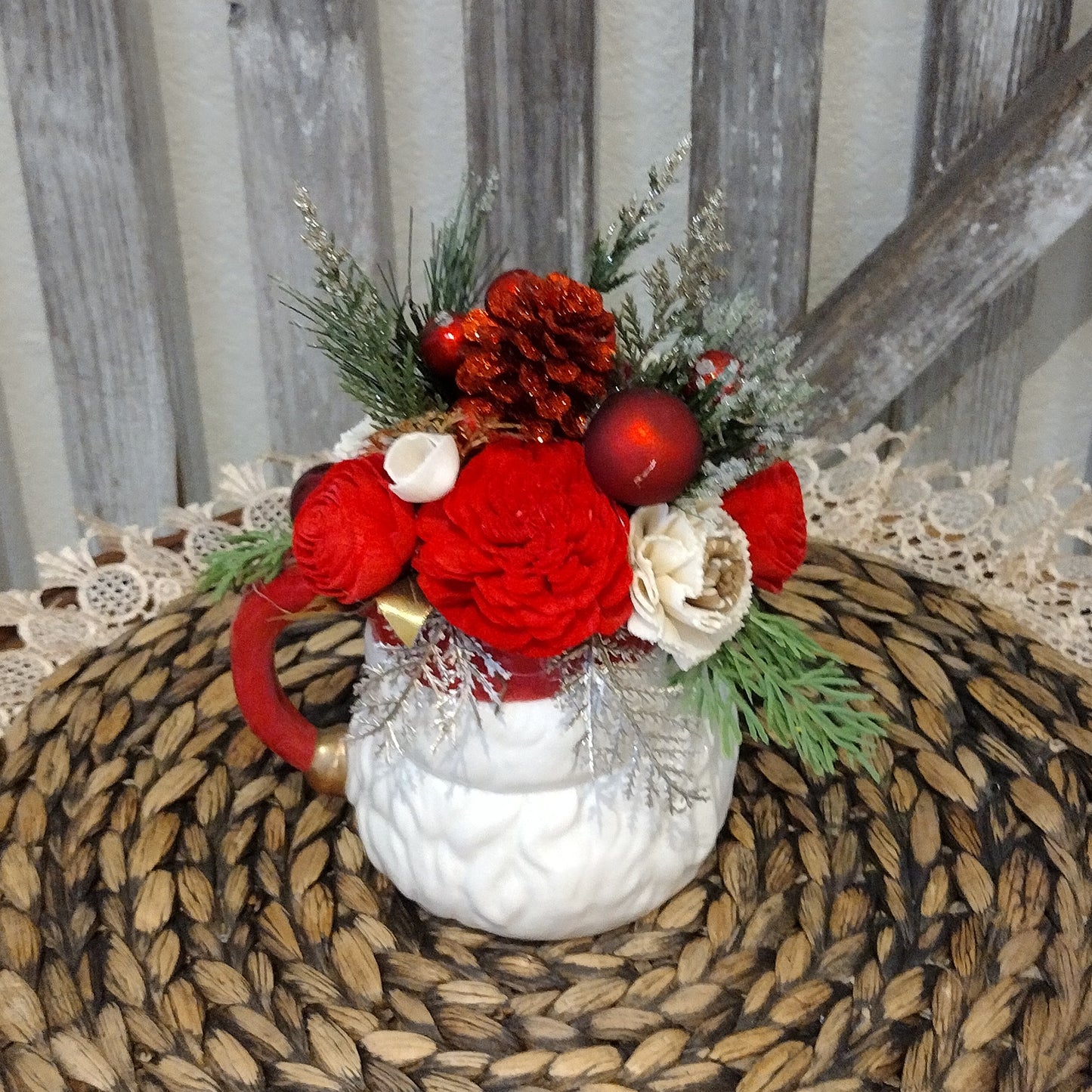 Santa mug filled with sola wood flowers that never die