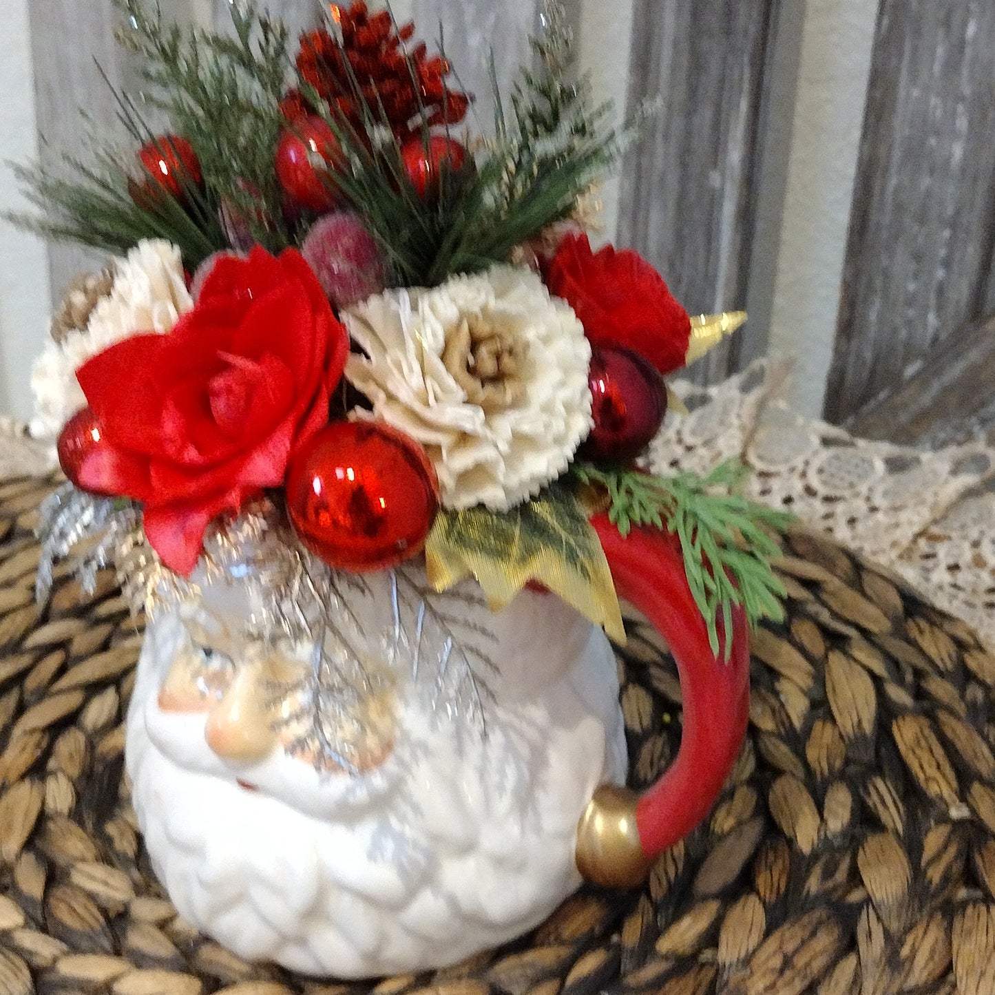 Santa mug filled with sola wood flowers that never die