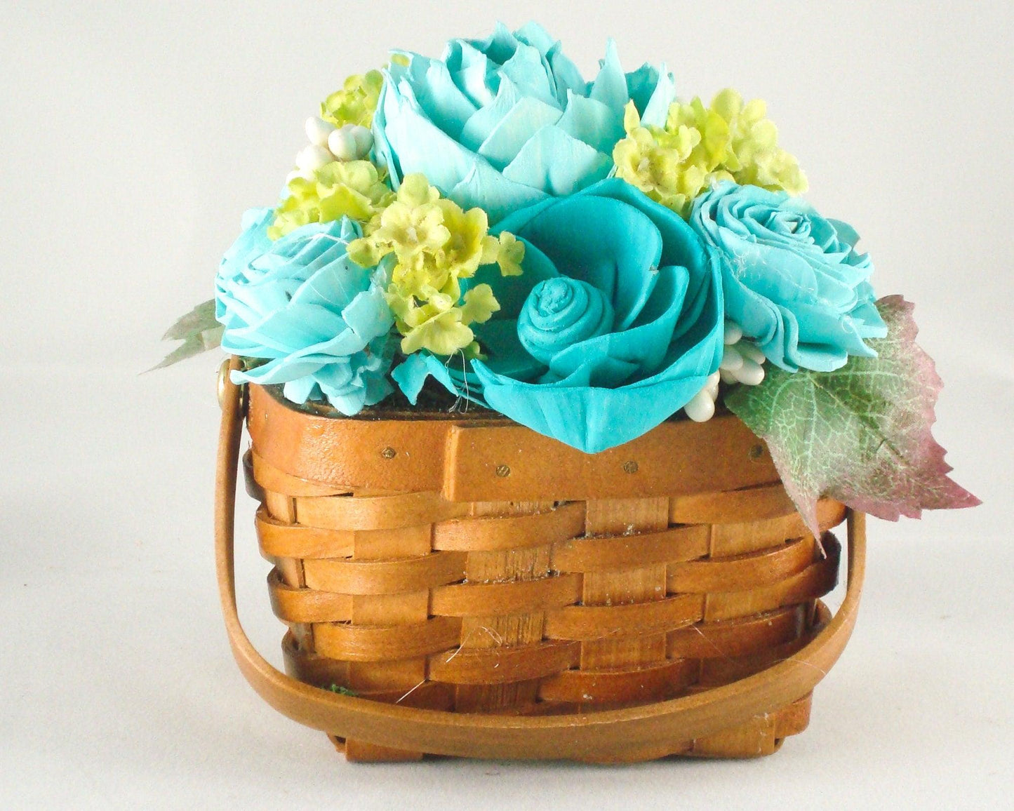 Hand Dyed Wedding florals teal in a basket