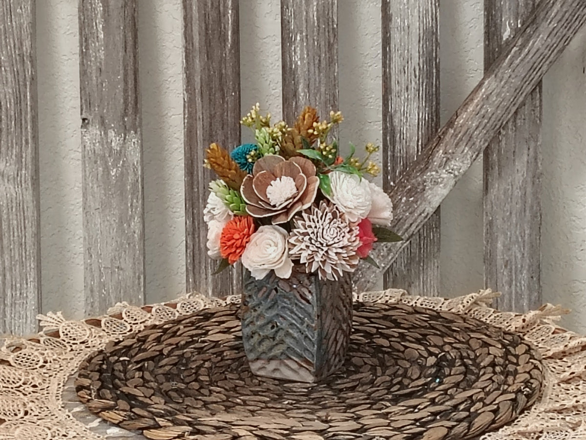 Teal and Orange Sola Wood Flower Arrangement in Textured Vase